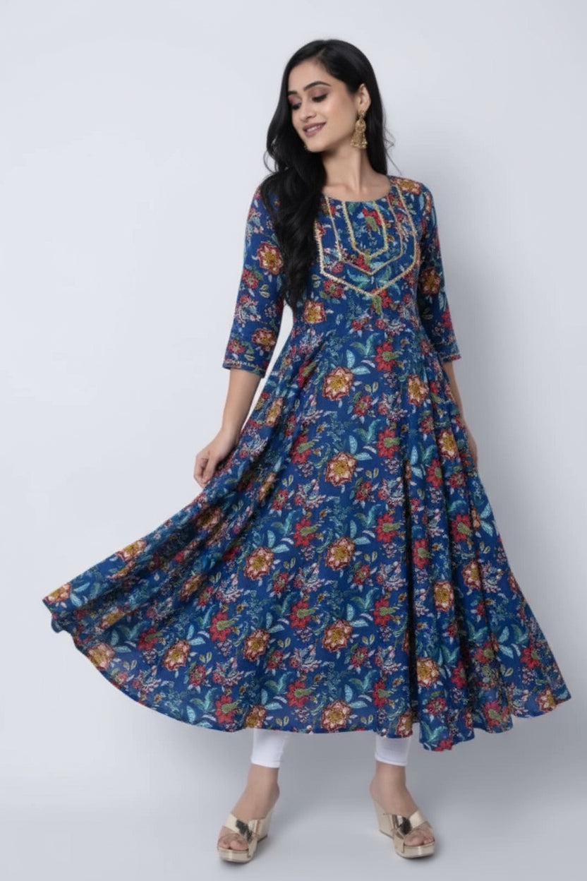 Woman wearing a blue floral dress on a white background